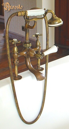 bath tap in brass with shower head 
