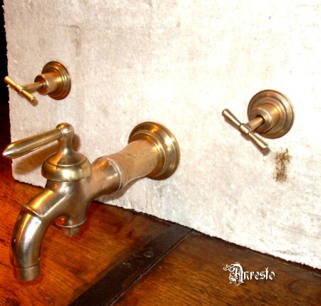 antique English wall tap